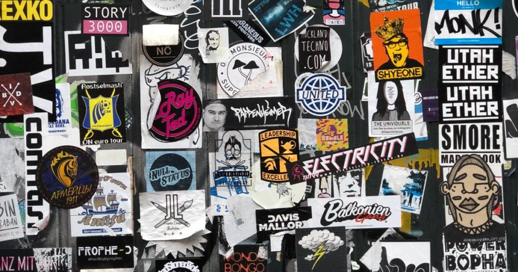 hundreds of music stickers on wall